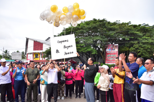 Pj Bupati Kapuas Launching Program Kapuas Bugar dan Juara di Stadion Panunjung Tarung