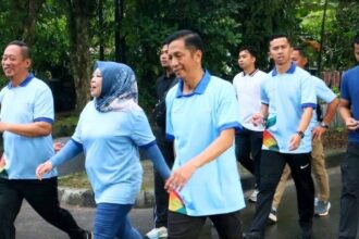 Pj Bupati Barito Utara Dukung Digitalisasi Lewat QRIS Fun Walk Bank Kalteng 2025